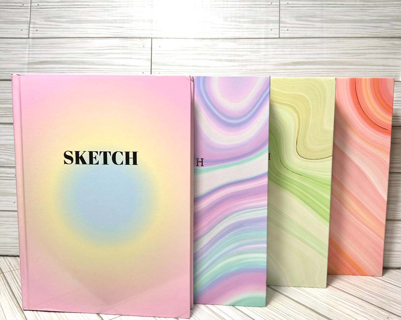 Sketch book 12” in x9” in .Blank drawing paper inside.