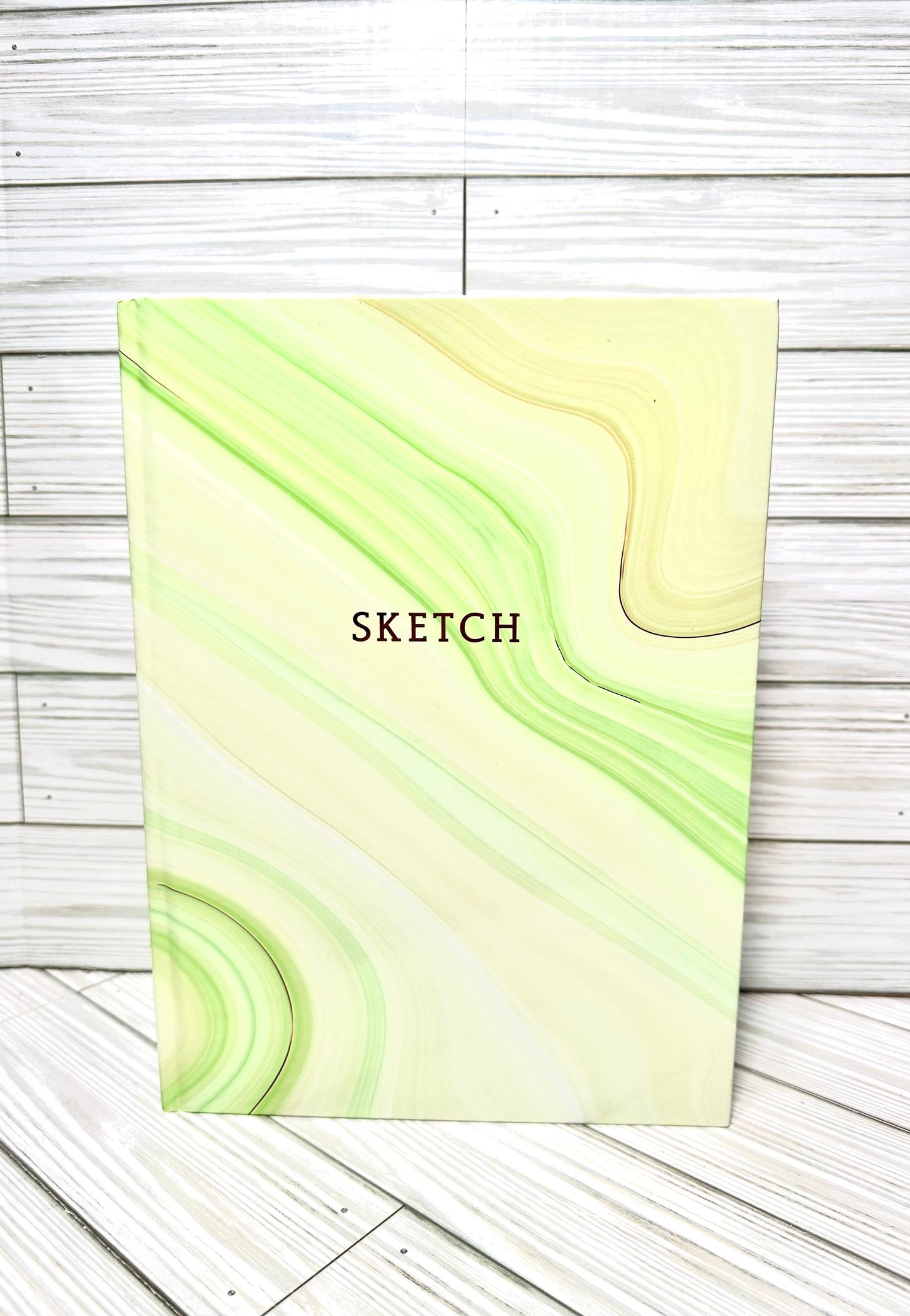 Sketch book 12” in x9” in .Blank drawing paper inside.